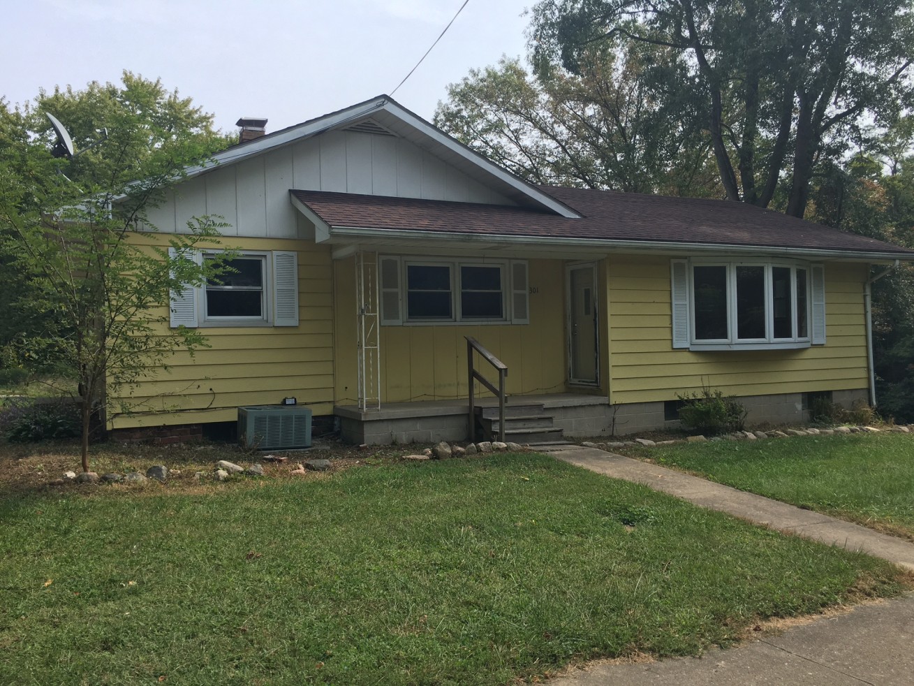 Ranch style home offering 3BR, 1BA & 1 car attached garage with rear