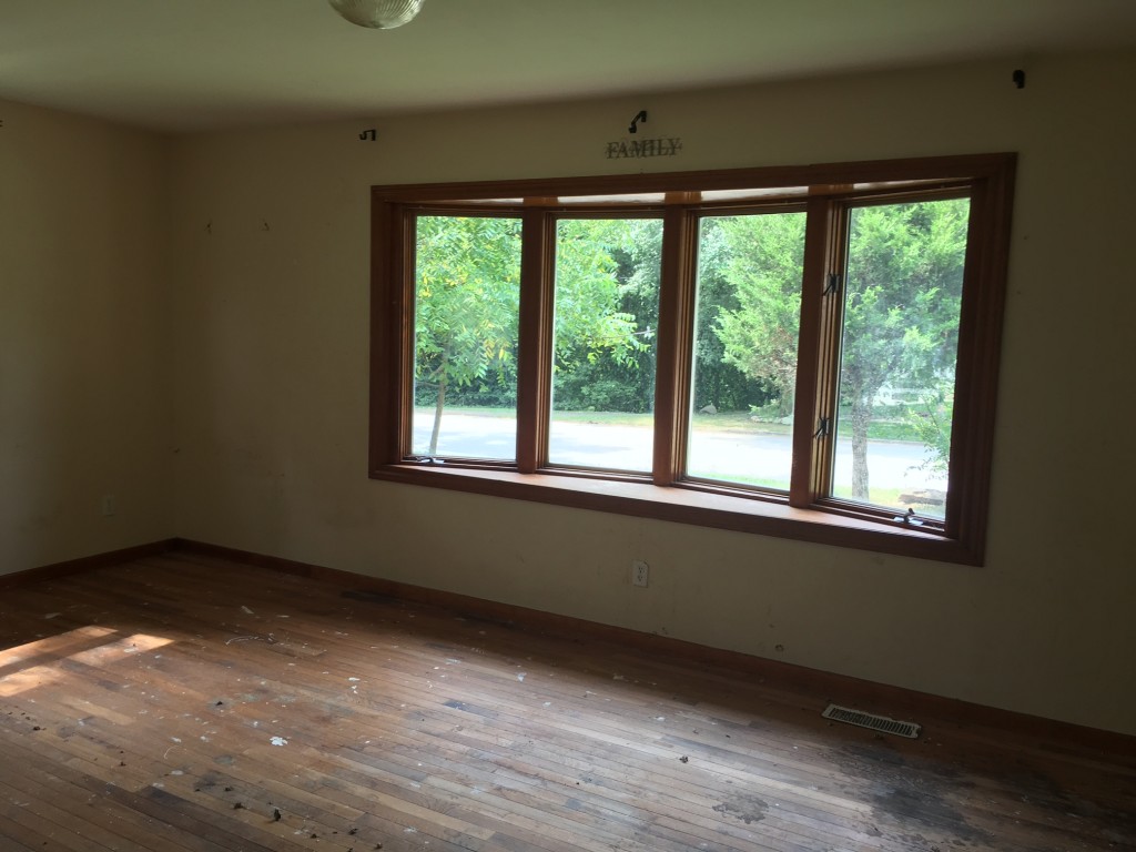 Ranch style home offering 3BR, 1BA & 1 car attached garage with rear