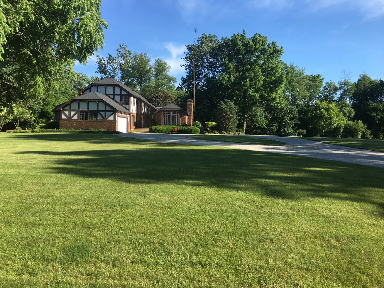 Absolutely stunning describes this 2 story English Tudor home on approx